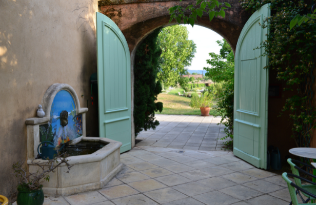  A table set with various plates of food and drinks, showcasing a colorful and inviting meal arrangement.